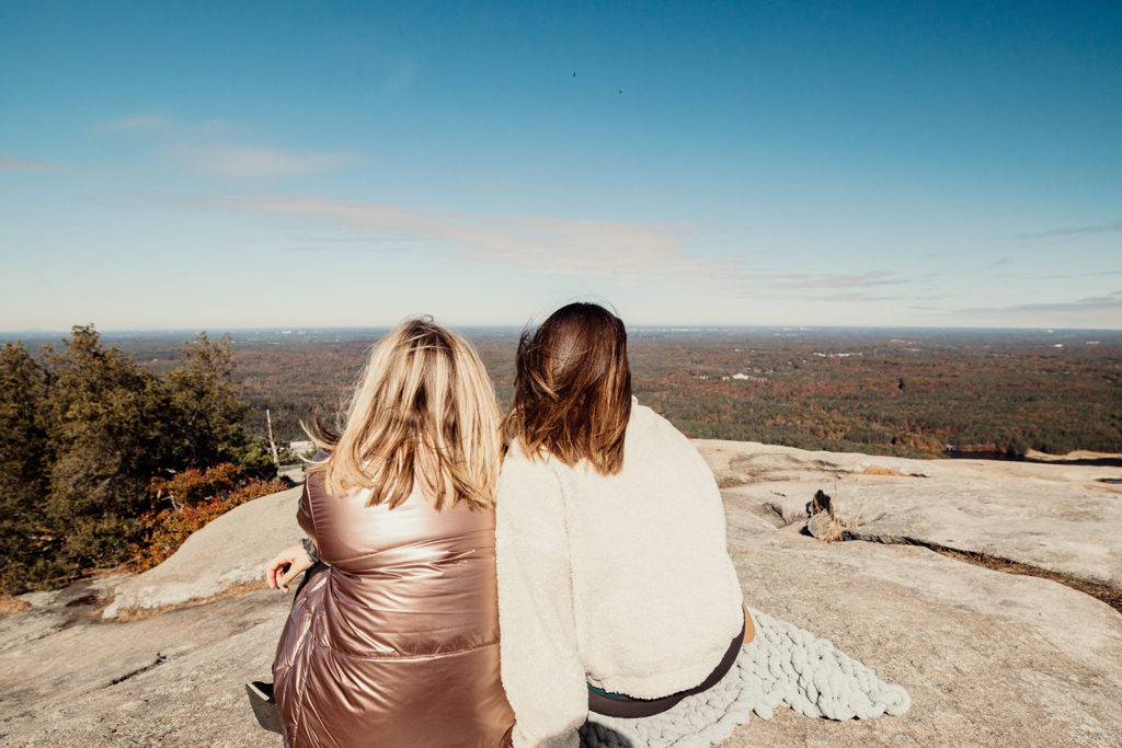 48 hours in Atlanta Guide: Sitting at the top of Stone Mountain looking at the view