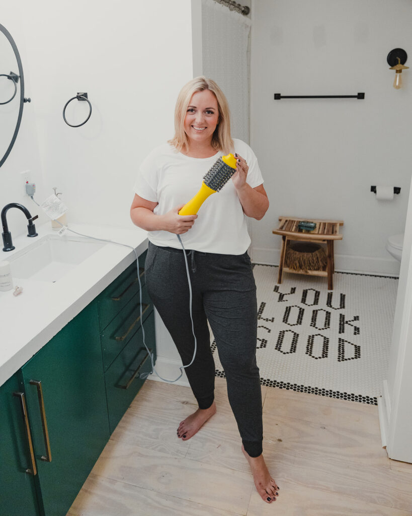 Woman Using Dry Bar Double Shot Blow Dry Brush - SellEatLove.com