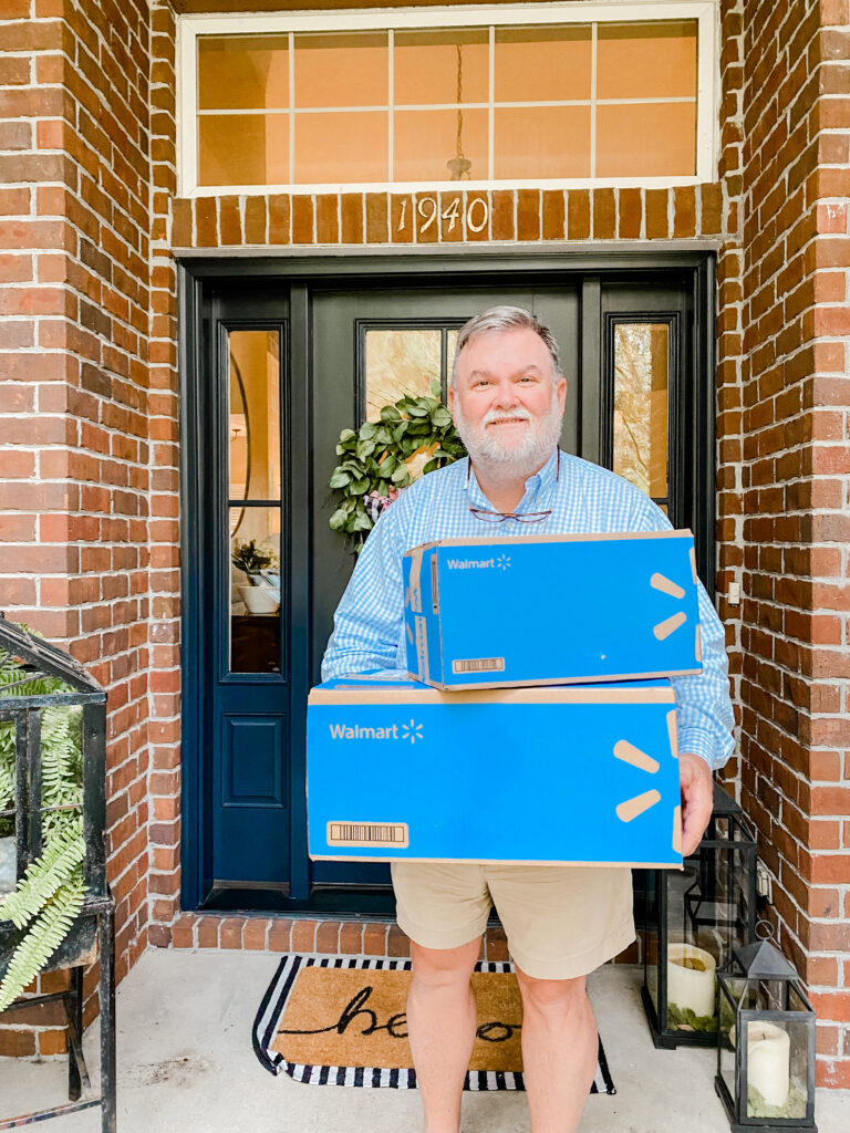 Walmart+ Membership - man holding boxes from Walmart+ for Fathers Day