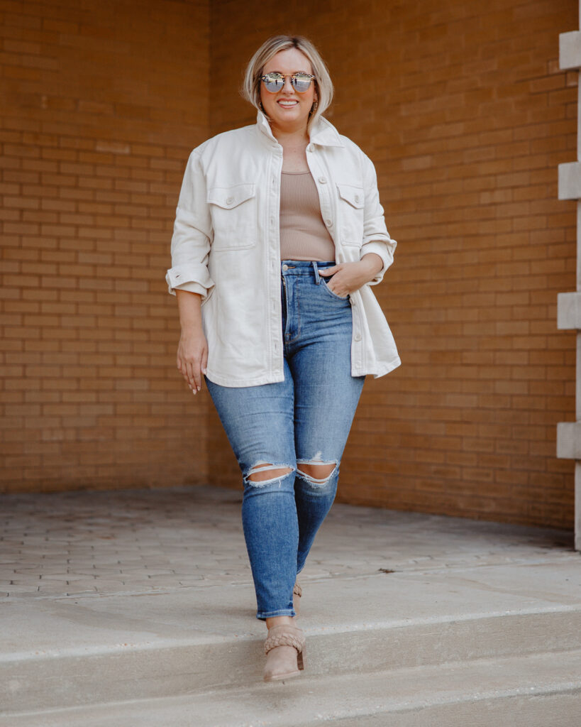 5 Trends to Try This Fall | Sell Eat Love. Neutral Shacket, neutral tank with Denim Jeans and bootie. 
